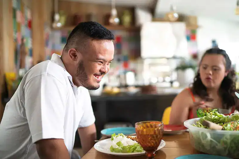 Empowering Weight Loss: A Comprehensive Guide for Individuals with Disabilities 2 Image of a disabled man and balance around nutrition to aid weight loss Hampton