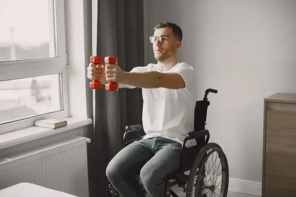 Image of man doing exercise in his wheelchair to aid weight loss Hampton