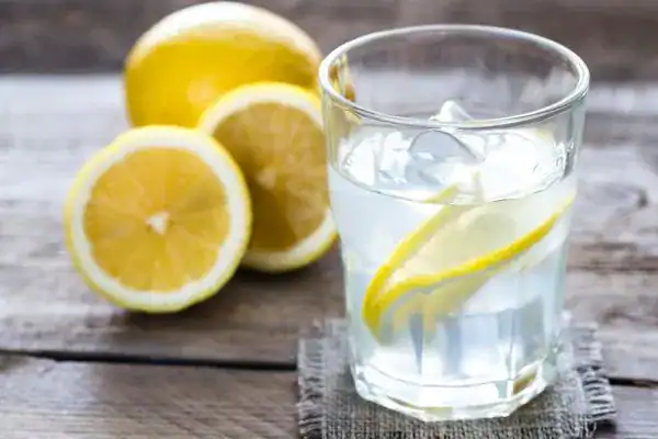 Hydration: The Secret Ingredient for a Toned Stomach and Enhanced Fitness 2 Image of lemon water to aid hydration Hampton